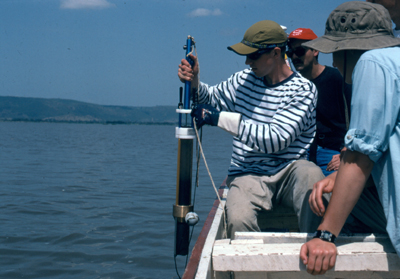 Researchers on a Boat Taking Samples