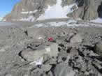 A sample from one of the outer ice-cored moraines, with a small alpine glacier/snowslope in the background.